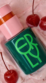 green and pink product in pink ice cream with cherries