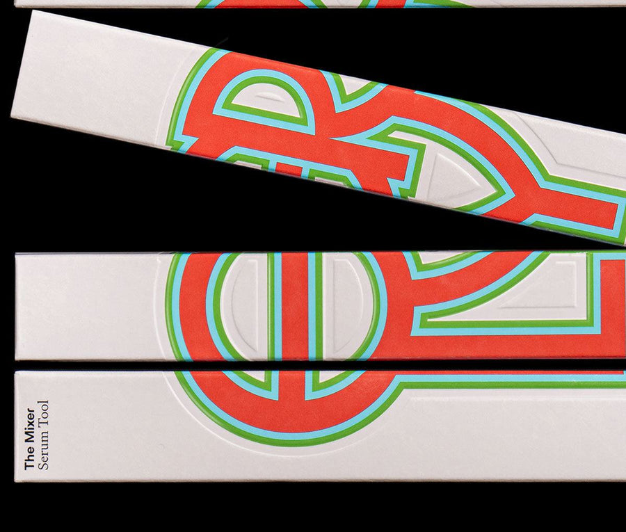 red and green packaging on black background