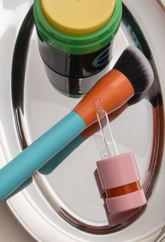 silver tray colorful beauty products