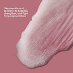 Close up of ERLY's Daily Dew Serum on a pink background with copy