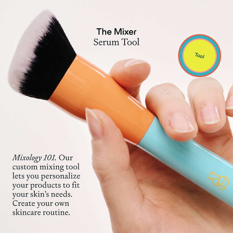 Hand holding ERLY The Mixer Brush with text