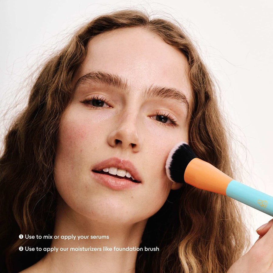 Model using ERLY's The Mixer Applicator Tool on her cheek with instructions in copy