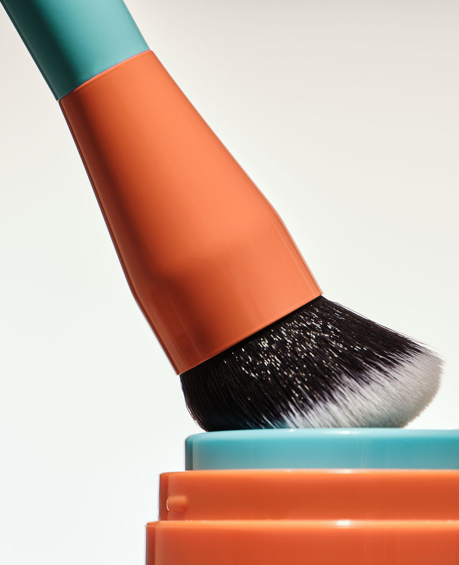 The ERLY Mixer Brush in use on top of SPF Moisturizer