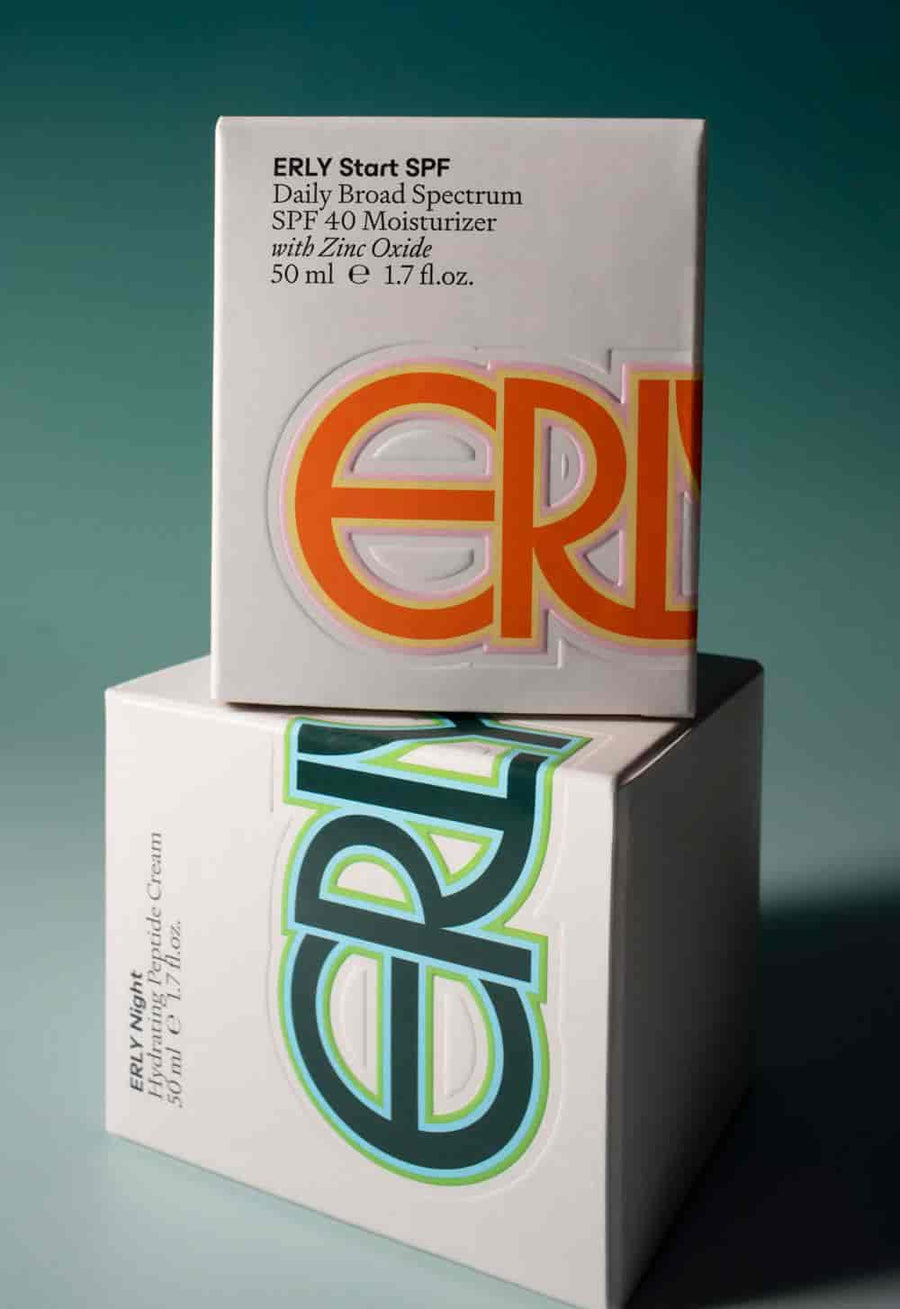 two erly skincare boxes stacked on top of each other on a gradient background 