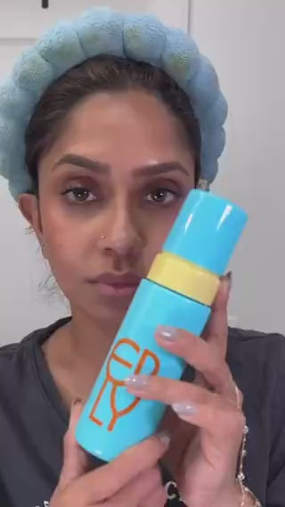 Video of a woman in a blue headband applying ERLY Face Foam