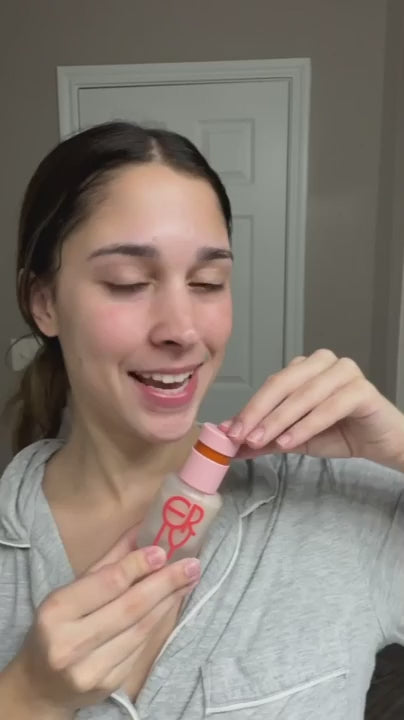 Video of a woman applying ERLY Daily Dew to her face