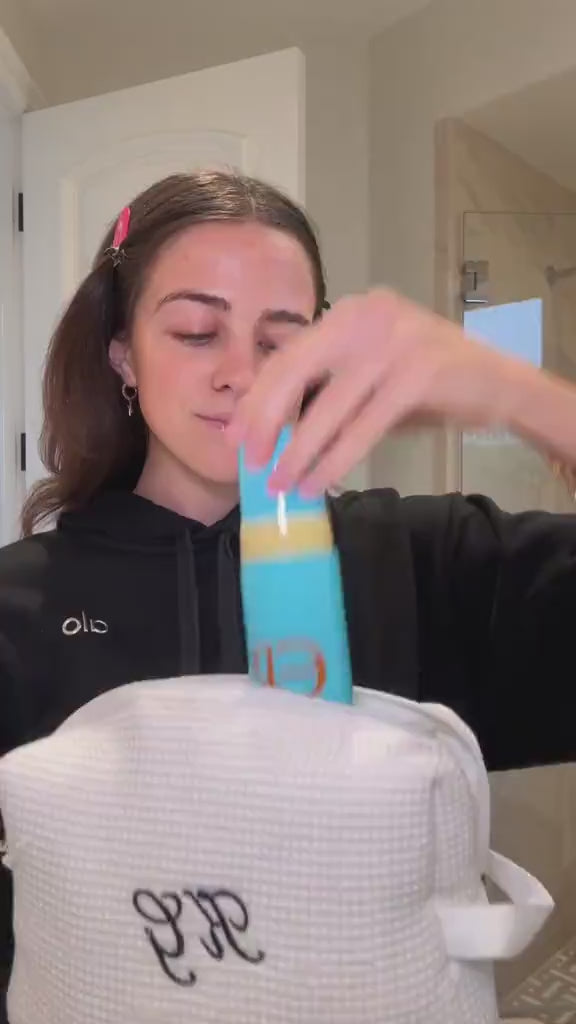 Woman using ERLY Face Foam to wash her face