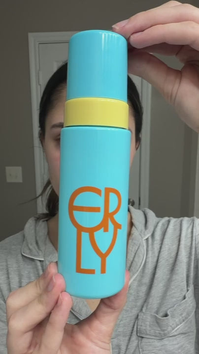 Video of a woman applying ERLY Face Foam to her face